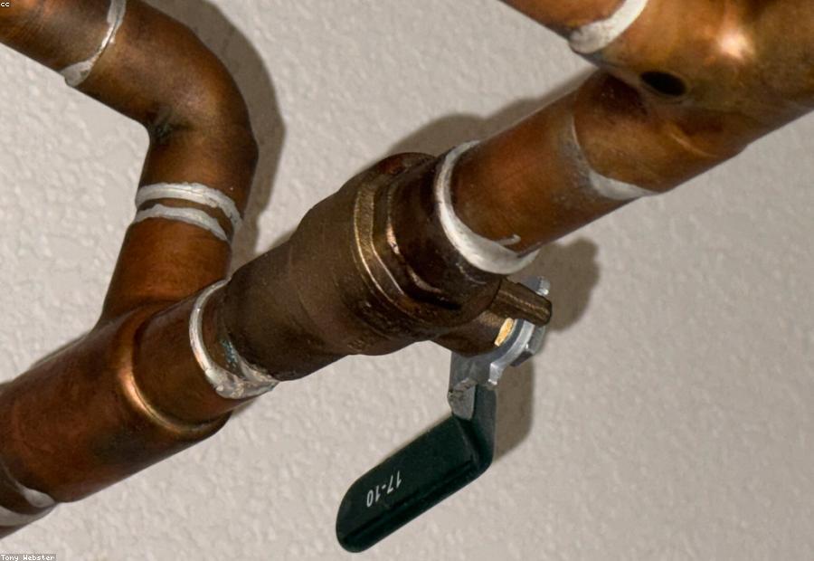 Main water shutoff valve at a residential meter in a Dallas home